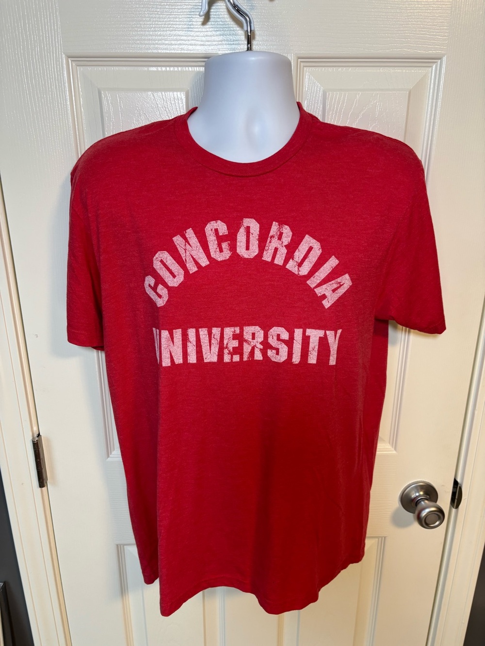 Red Concordia University T-shirt with size Large